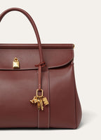 ANNIVERSARY BAG CHARM ROUNDED LEATHER/BRASS_FAP5201_P0AR_NR_3